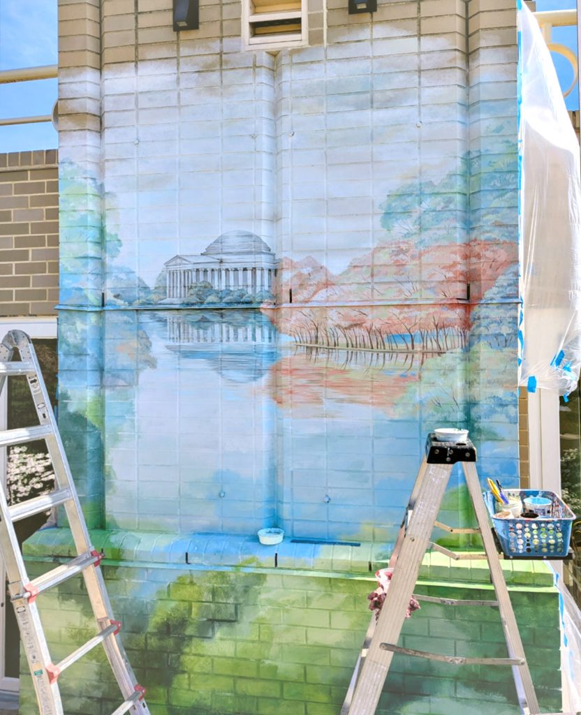 rooftop-balcony-mural-process-washington-dc-yulia-avgustinovich Artist painting rooftop balcony mural at private residence in Washington DC