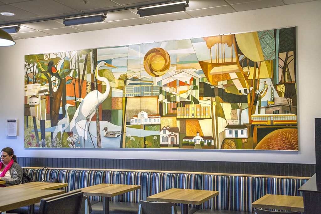 auroras-beauty-interior-mural-kroger-aurora-co Interior mural titled “Aurora’s Beauty” in a Kroger supermarket in Aurora, Colorado, featuring city landmarks, parks, and local flora and fauna.