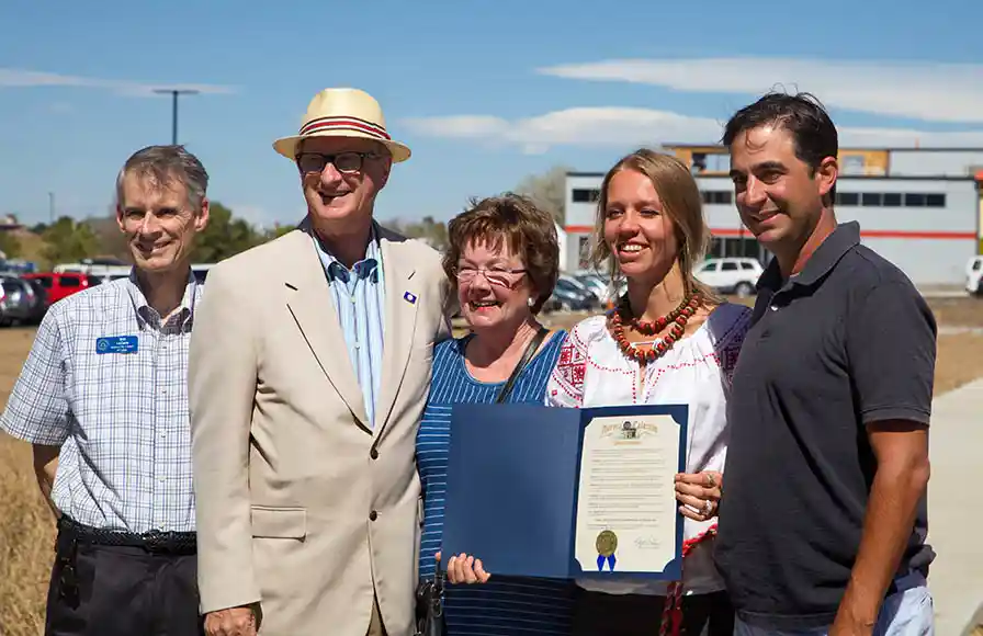 Celebration of community ground mural Aurora Colorado with mayor and development team